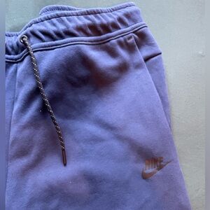 Blue Nike tech joggers